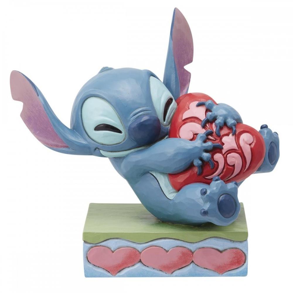 Figura Enesco Disney Stitch Abrazando un Corazón - 13 cm